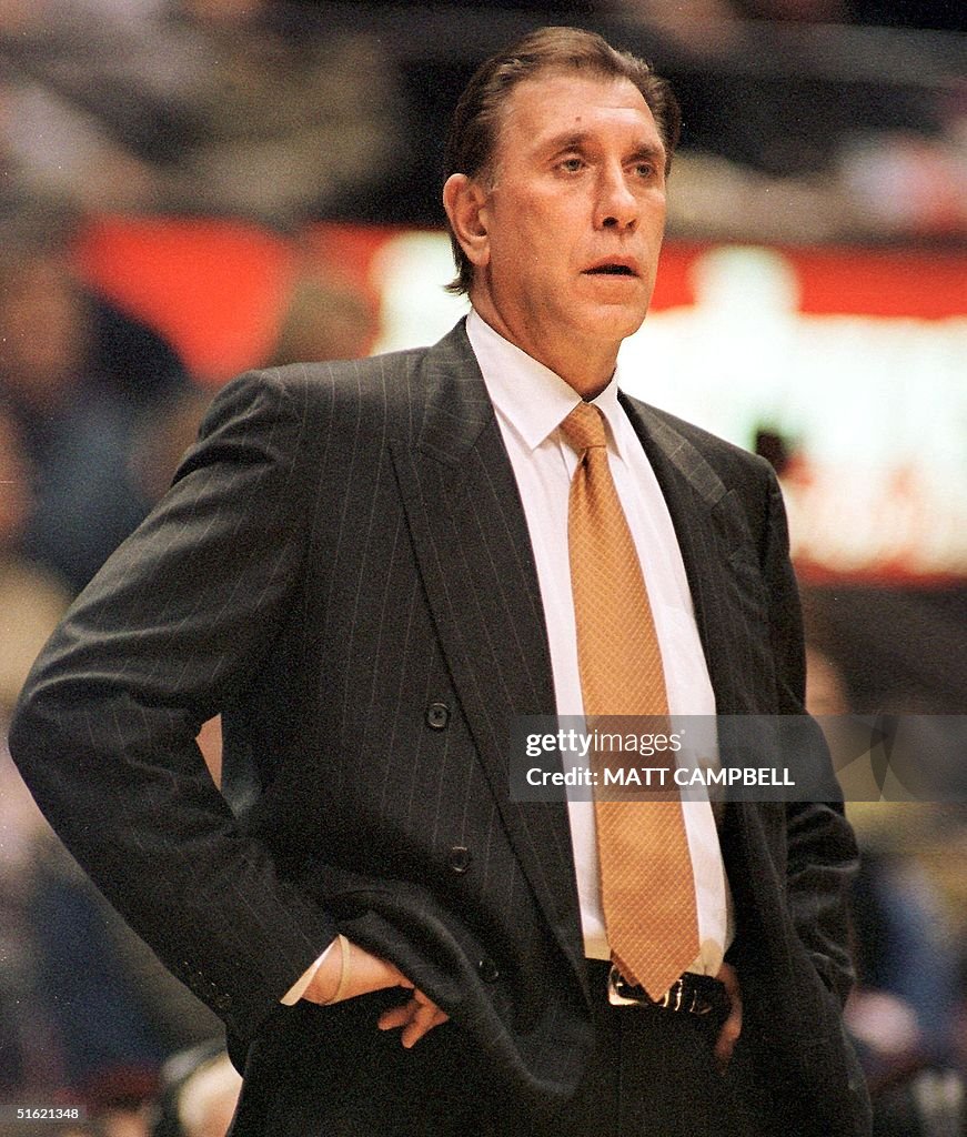 Rudy T Rockets Houston Rockets' head coach Rudy Tomjanovich watches from the... News ...