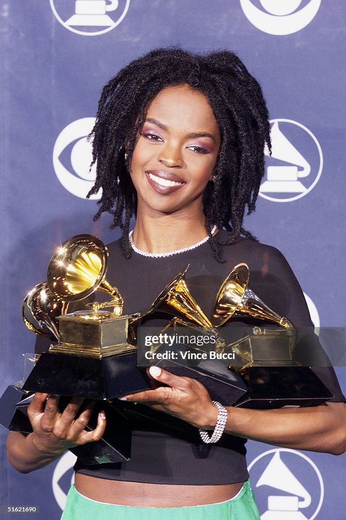 Singer Lauryn Hill poses with her five Grammy awar
