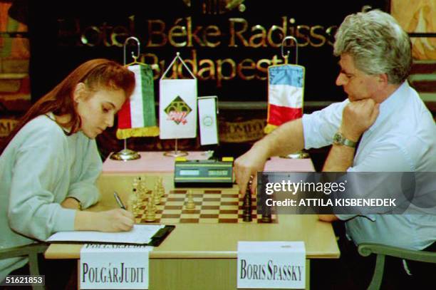 The youngest international chess grand master, 17-year-old Judit Polgar writes down her first move 16 February, 1993 in her last match with Russian...