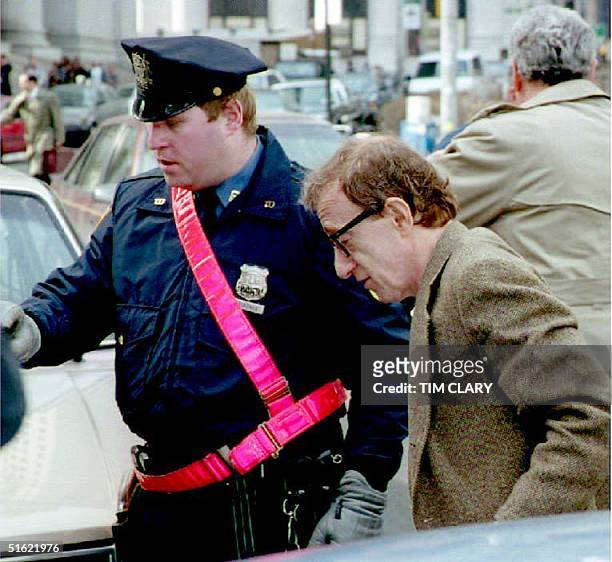 Actor-Director Woody Allen arrives at the State Supreme Court 23 March 1993 for the third day of testimony in his child custody battle with actress...