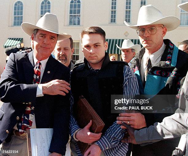 John William "Bill" King is led from the Jasper County Courthouse by unidentified deputies following the first day of jury selection in his murder...