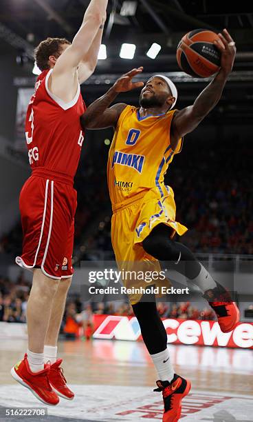 Tyrese Rice, #0 of Khimki Moscow Region competes with Janis Strelnieks, #13 of Brose Baskets Bamberg in action during the 2015-2016 Turkish Airlines...