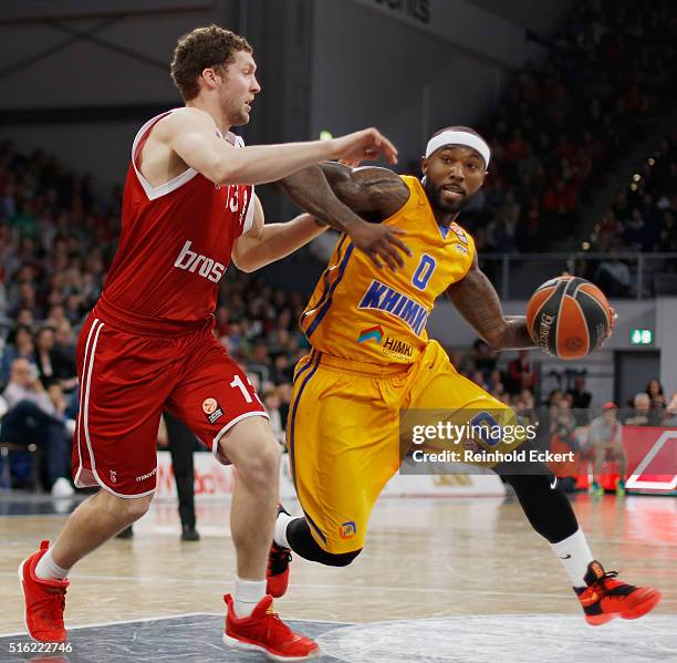 Tyrese Rice, #0 of Khimki Moscow Region competes with Janis Strelnieks, #13 of Brose Baskets Bamberg in action during the 2015-2016 Turkish Airlines...