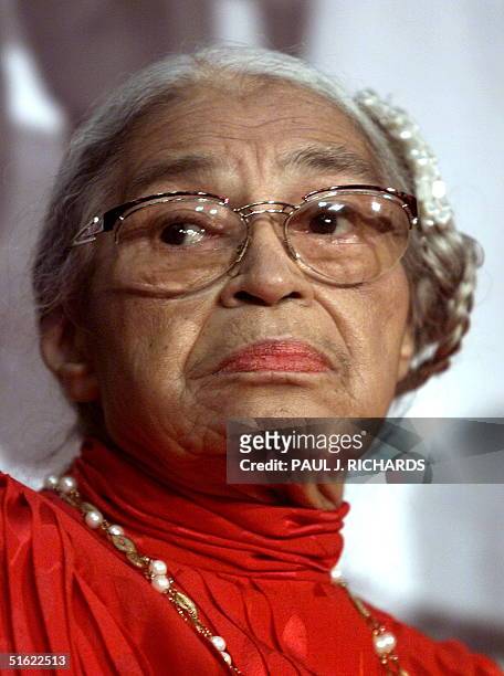 Civil rights heroine Rosa Parks attends the opening of "Marching Toward Justice: The History of the 14th Amendment of the US Constitution" ribbon...