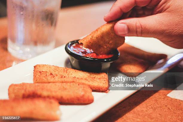 person eating snacks with sauce - f��retag bildbanksfoton och bilder
