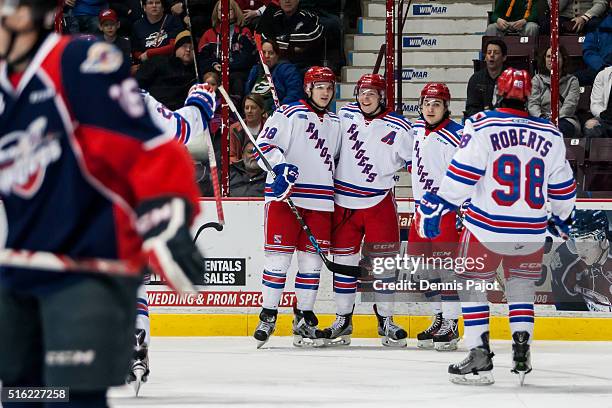 Forward Darby Llewellyn of the Kitchener Rangers celebrates a goal against the Windsor Spitfires on March 17, 2016 at the WFCU Centre in Windsor,...