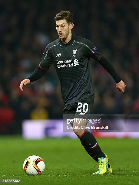 Adam Lallana of Liverpool in action during the UEFA Europa League round of 16 second leg match between Manchester United and Liverpool at Old...