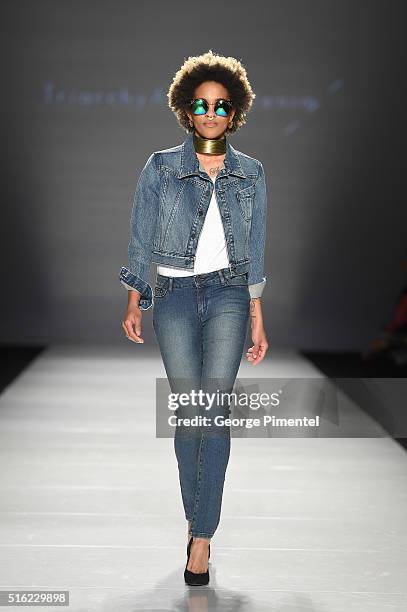 Model walks the runway wearing Triarchy 2016 collection during Toronto Fashion Week Fall 2016 at David Pecaut Square on March 17, 2016 in Toronto,...