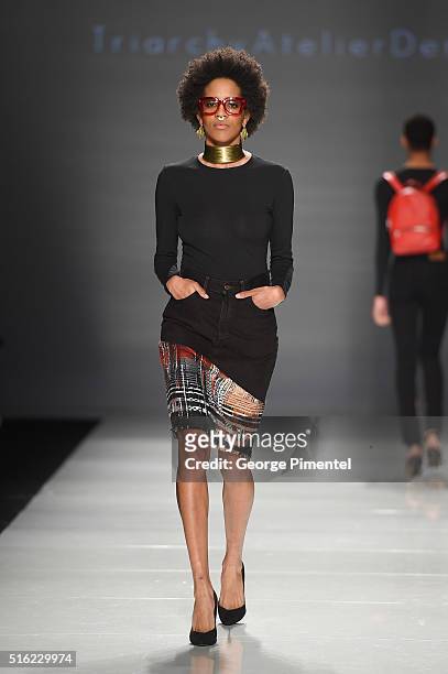 Model walks the runway wearing Triarchy 2016 collection during Toronto Fashion Week Fall 2016 at David Pecaut Square on March 17, 2016 in Toronto,...