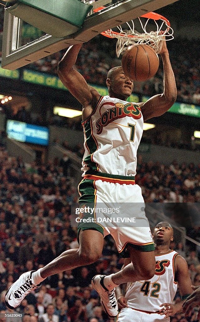 Seattle Supersonic rookie Rashard Lewis (top) slam