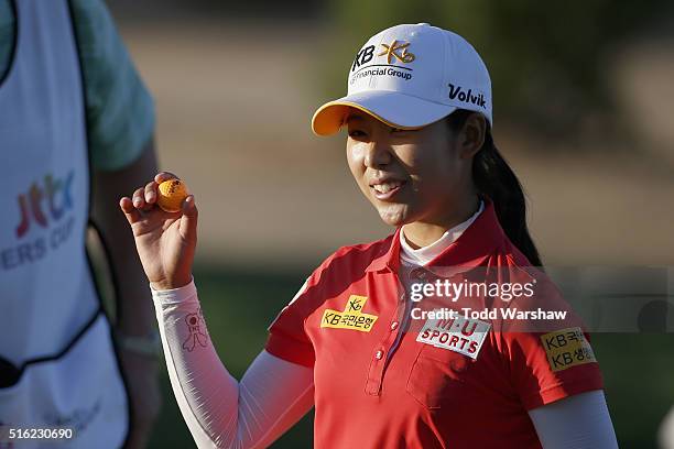 Mi Hyang Lee of South Korea waves to the crowd on the 9th hole during the first round of the LPGA JTBC Founders Cup at Wildfire Golf Club on March...