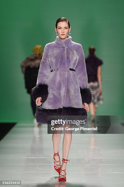 Model walks the runway wearing Farley Chatto 2016 collection during Toronto Fashion Week Fall 2016 at David Pecaut Square on March 17, 2016 in...