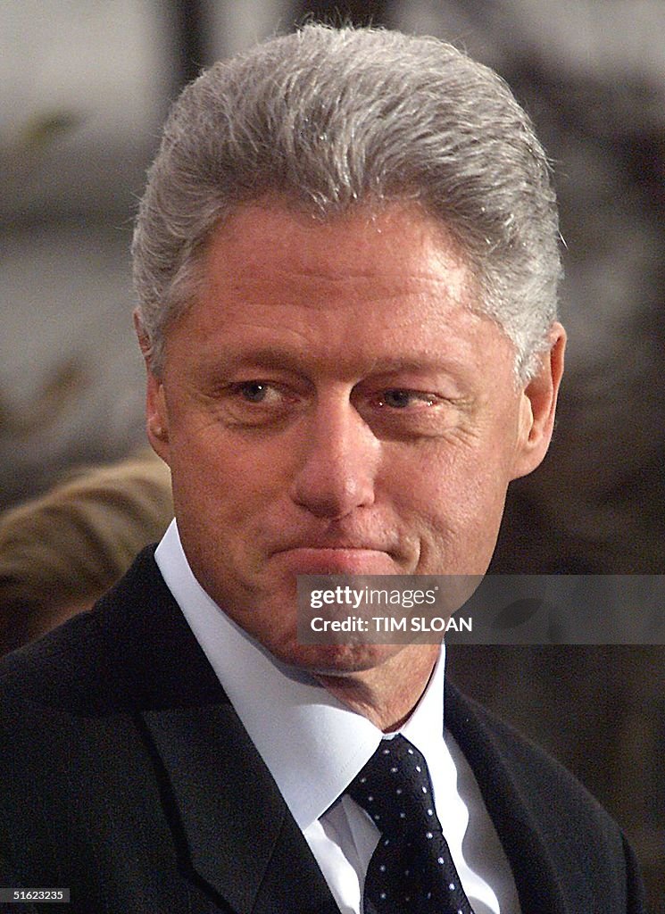 US President Bill Clinton appears after making a s