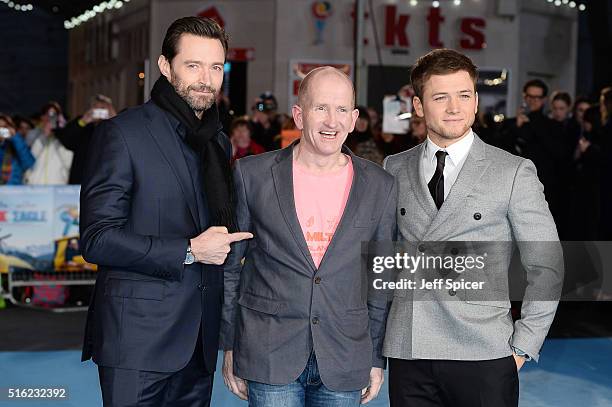 Hugh Jackman, Eddie Edwards and Taron Egerton arrive for the European premiere of 'Eddie The Eagle' at Odeon Leicester Square on March 17, 2016 in...