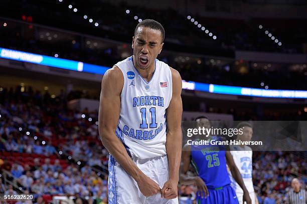 Brice Johnson of the North Carolina Tar Heels celebrates in the second half against the Florida Gulf Coast Eagles during the first round of the 2016...