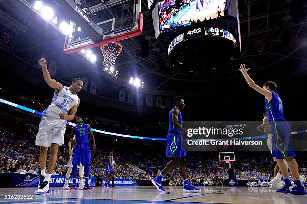 Brice Johnson of the North Carolina Tar Heels celebrates in the second half against the Florida Gulf Coast Eagles during the first round of the 2016...