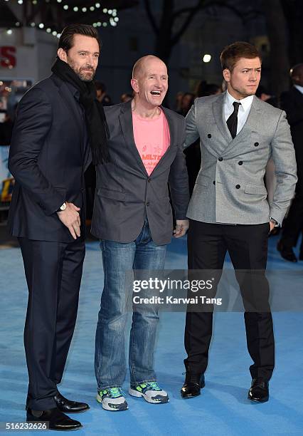 Hugh Jackman, Eddie 'The Eagle' Edwards and Taron Egerton arrive for the European premiere of 'Eddie The Eagle' at Odeon Leicester Square on March...