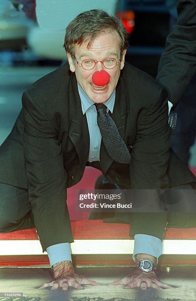 Antor Robi Academy Award-winning actor Robin Williams wears a clown nose as he ...
