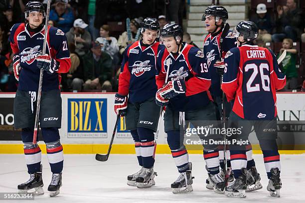 Forward Christian Fischer of the Windsor Spitfires celebrates his goal against the Kitchener Rangers on March 17, 2016 at the WFCU Centre in Windsor,...