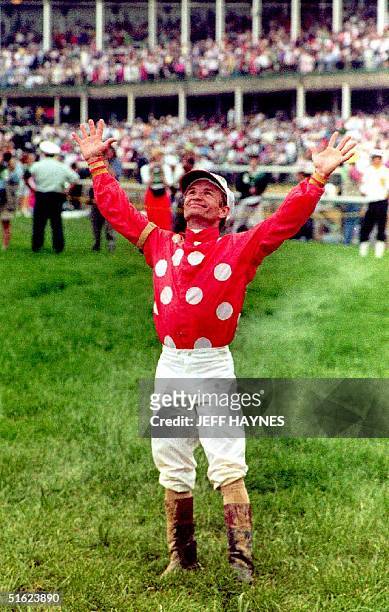 Kentucky: Jockey Pat Day looks to the skies after winning his first Kentuky Derby while riding Lil E. Tee 02 May 1992 in the 118th running of the...