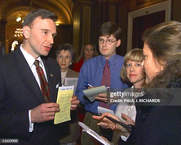 Rep. And Republican manager, James E. Rogan briefs reporters in the halls of the US Senate 20 January on the fifth day of the US Senate impeachment...