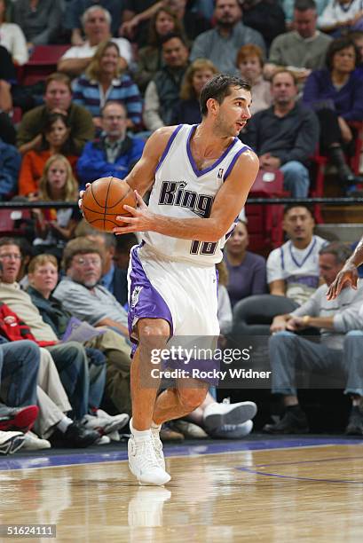 Predrag Stojakovic looks crosscourt against the New Orleans Hornets of the Sacramento Kings during the preseason game at Arco Arena on October 23,...