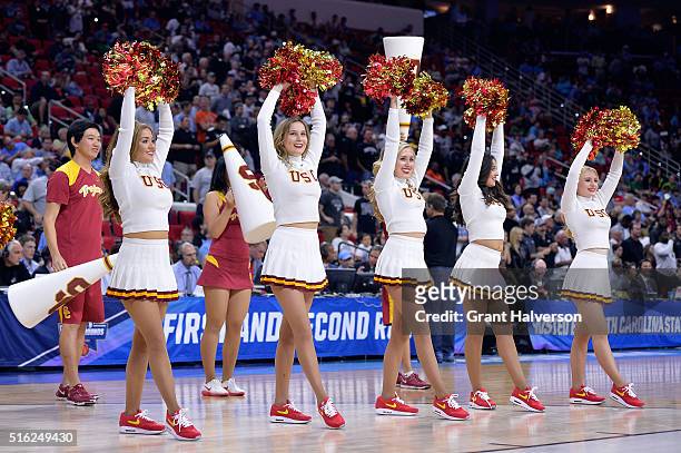 Trojans cheerleaders perform in their game against the Providence Friars during the first round of the 2016 NCAA Men's Basketball Tournament at PNC...