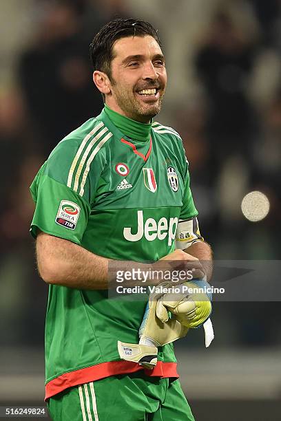 Gianluigi Buffon of Juventus FC celebrates victory and his record of minutes without conceding goals at the end of the Serie A match between Juventus...