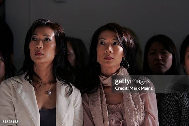 Actresses Ada Tai, and Arlene Tai at the BatOs Daughter Spring 2005 show at the Mercedes-Benz Fashion Week at Smashbox Studios in October 29, 2004...