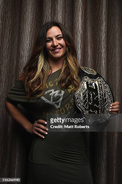 Women's bantamweight champion Miesha Tate poses during the Ultimate Media Day on March 18, 2016 in Brisbane, Australia.
