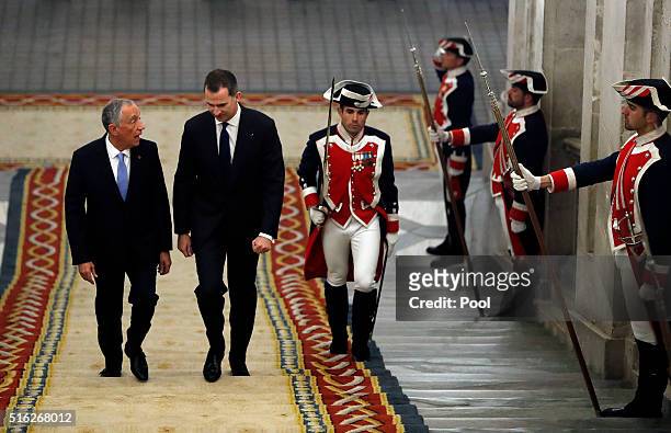 Spanish King Felipe VI receives Portugal president Marcelo Rebelo de Sousa at the Royal Palace March 17, 2016 in Madrid, Spain. De Sousa was making...