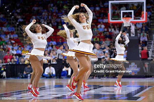 Trojans cheerleaders perform in the game against the Providence Friars during the first round of the 2016 NCAA Men's Basketball Tournament at PNC...
