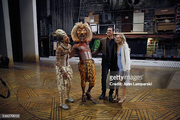 Cast members, Chanel Riley and Jelani Remy pose with "Bachelor" Ben Higgins and fiancee Lauren Bushnell at the "The Lion King" on Broadway at...