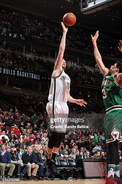 Sergey Karasev of the Brooklyn Nets shoots the ball during the game against the Chicago Bulls on March 17, 2016 at the United Center in Chicago,...