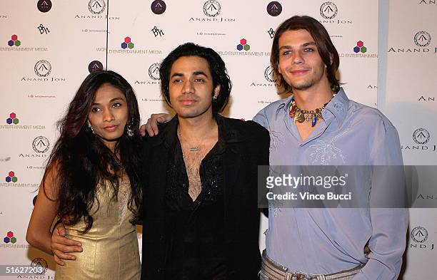 Indian designer Anand Jon poses with his sister Sanjina and actor Trent Ford at his West Coast debut couture fashion show "Apsare: Divine Concubines"...