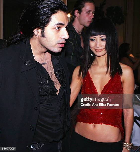 Model Bai Ling backstage with fashion designer Arnand Jon in preparation of the West Coast couture debut of Anand Jon's fashion show, "Aspare: Divine...