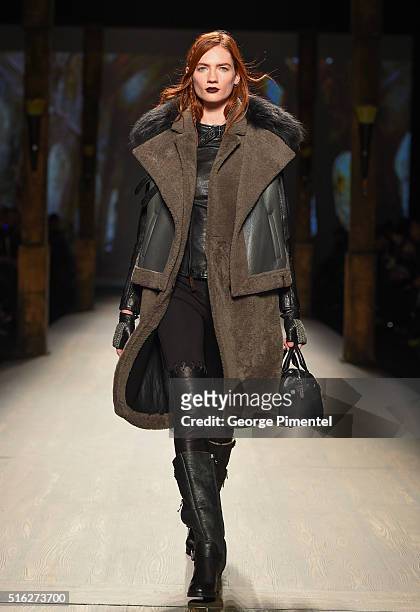 Model walks the runway wearing Rudsak 2016 collection during Toronto Fashion Week Fall 2016 at David Pecaut Square on March 17, 2016 in Toronto,...
