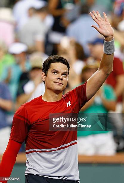 Milos Raonic of Canada celebrates defeating Gael Monfils of France during day eleven of the BNP Paribas Open at Indian Wells Tennis Garden on March...