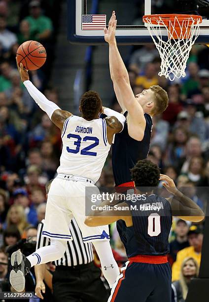 Derrick Gordon of the Seton Hall Pirates goes up against Domantas Sabonis of the Gonzaga Bulldogs in the first half during the first round of the...