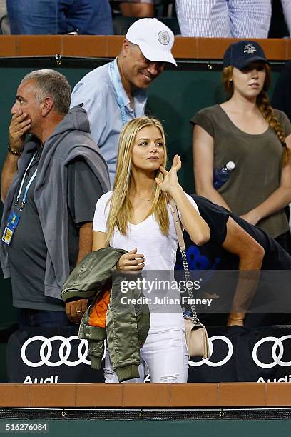 Danielle Knudson, girlfriend of Milos Raonic of Canada looks on after his win over Gael Monfils of France during day eleven of the BNP Paribas Open...