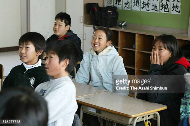 Mao Asada watches her performance with her classmates on January 7, 2003 in Nagoya, Aichi, Japan.