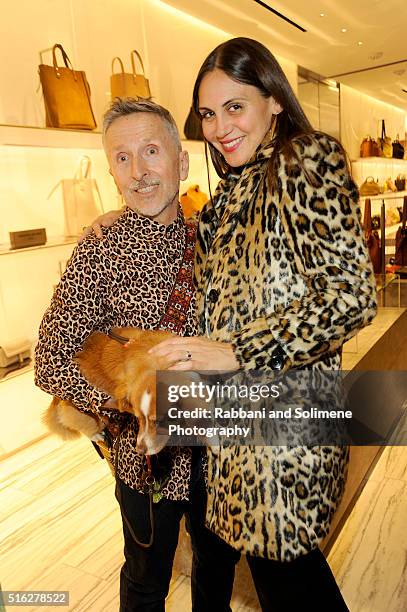 Simon Doonan and a guest attend the Barneys New York celebration of its new downtown flagship in New York City on March 17, 2016 in New York City.