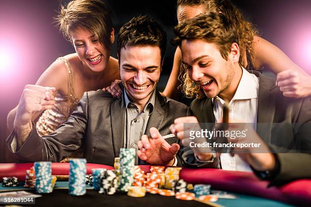 kisses by the luck at poker - casino stock pictures, royalty-free photos & images