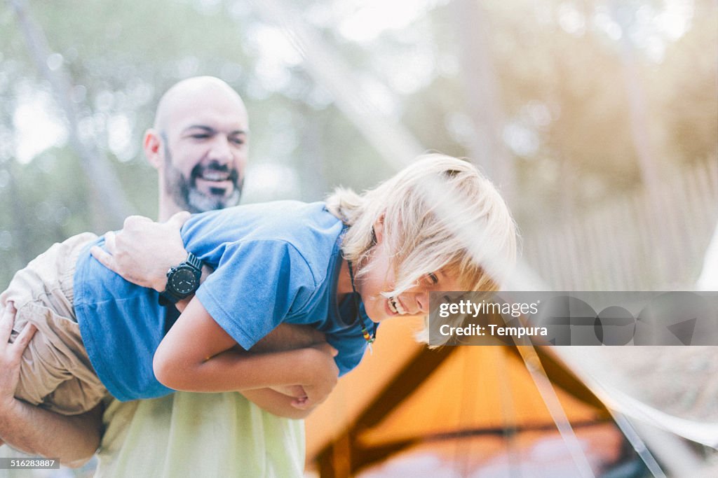 Jubliant family enjoying a day out.