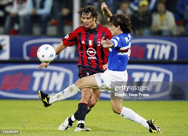 Sampdoria's Sergio Volpi challenges Milan's Paolo Maldini during the Italian Serie A match between Sampdoria and AC Milan at Stadio Luigi Ferraris,...