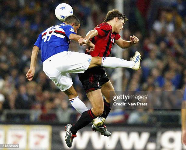 Sampdoria's Angelo Palombo challenges Milan's Hernan Crespo during the Italian Serie A match between Sampdoria and AC Milan at Stadio Luigi Ferraris,...