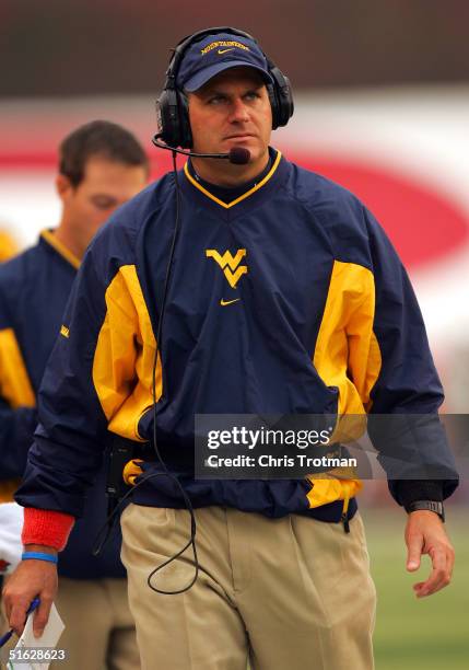 Head coach Rich Rodriguez of the West Virginia Mountaineers paces the sideline during the game against the Rutgers University Scarlet Knights on...