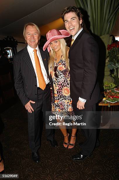 Glenn Wheatley, Stephanie McIntosh and Peter Timbs pose during the AAMI Victoria Derby Day at Flemington Racecourse October 30, 2004 in Melbourne,...