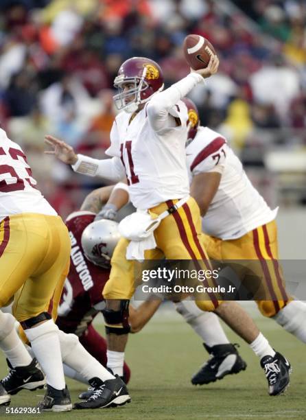 Quarterback Matt Leinart of the USC Trojans passes against the Washington State Cougars on October 30, 2004 at Martin Stadium in Pullman, Washington.