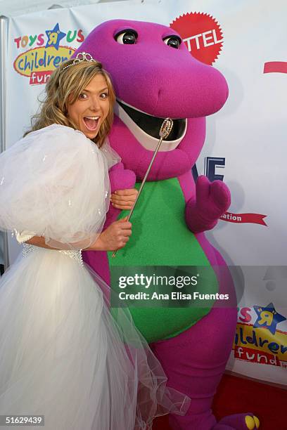 Actress Debbie Matenopoulos and Barney attend the 11th annual Children Affected by AIDS Dream Halloween fundraiser on October 30 in Santa Monica,...